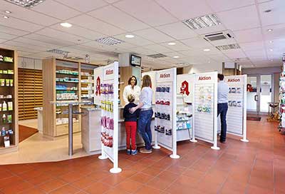 Pharmacy with privacy walls